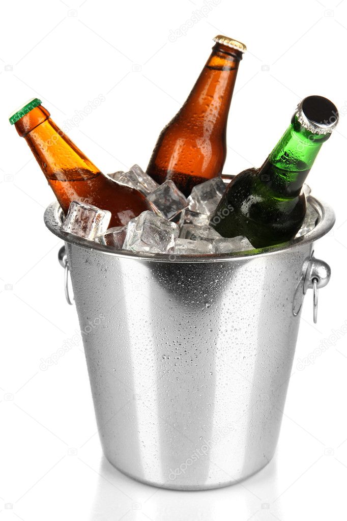 Beer bottles in ice bucket isolated on white