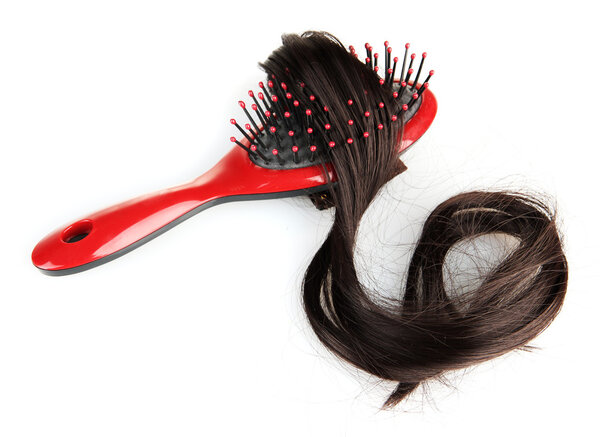 comb brush with hair, isolated on white
