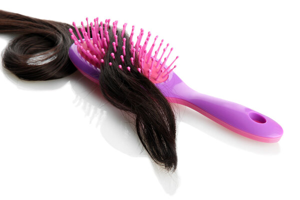 comb brush with hair, isolated on white