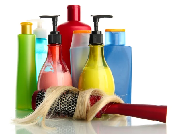 Kam borste med frisör- och flaskor, isolerad på vit — Stockfoto