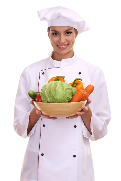 Retrato de mujer joven chef con verduras aisladas en blanco —  Fotos de Stock