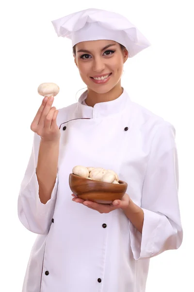Portrait of young woman chef with mushrooms isolated on white — Stock Photo, Image