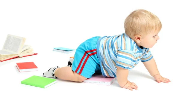 Kleine jongen met multicolor boeken, geïsoleerd op wit — Stockfoto