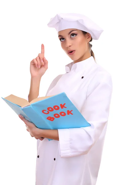 Retrato de jovem chef com livro de cozinha isolado em branco — Fotografia de Stock