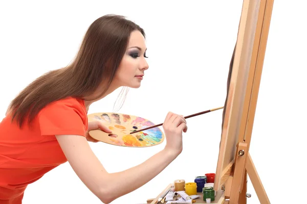 Beautiful young woman painter at work, isolated on white — Stock Photo, Image