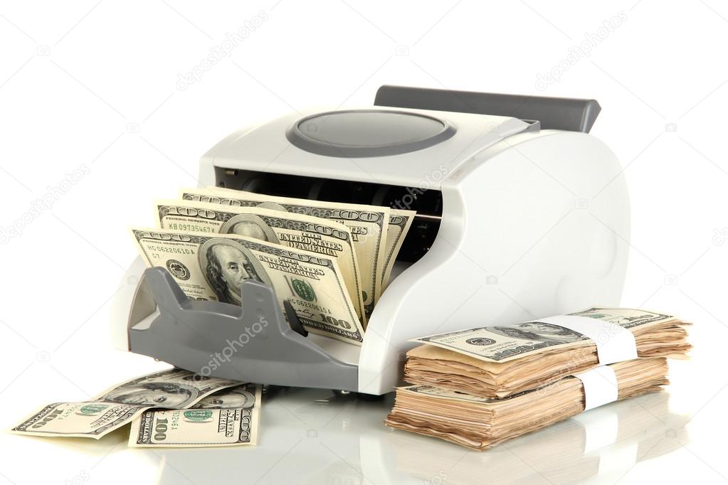 Machine for counting money and 100 dollar bills isolated on white