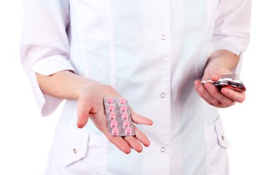 kadın doktor el hapları, üzerinde beyaz izole tutarak yakın çekim