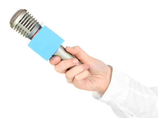 Женская рука с микрофоном изолированы на белом — стоковое фото