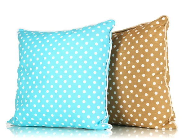 Travesseiros azuis e castanhos brilhantes isolados em branco — Fotografia de Stock