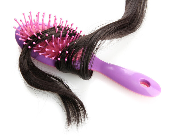 comb brush with hair, isolated on white
