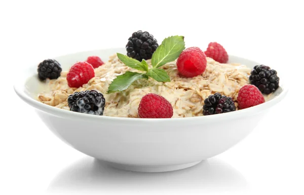 Tasty oatmeal with berries, isolated on white — Stock Photo, Image