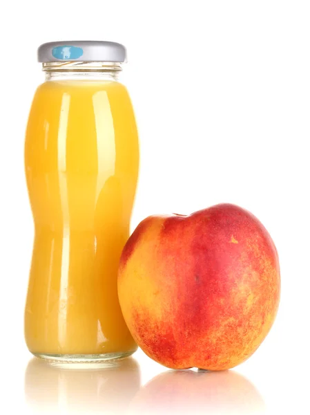 Delicious peach juice in glass bottle and peach next to it isolated on white — Stock Photo, Image