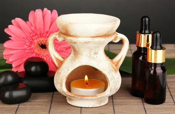 Aromatherapie lamp op grijze achtergrond — Stockfoto