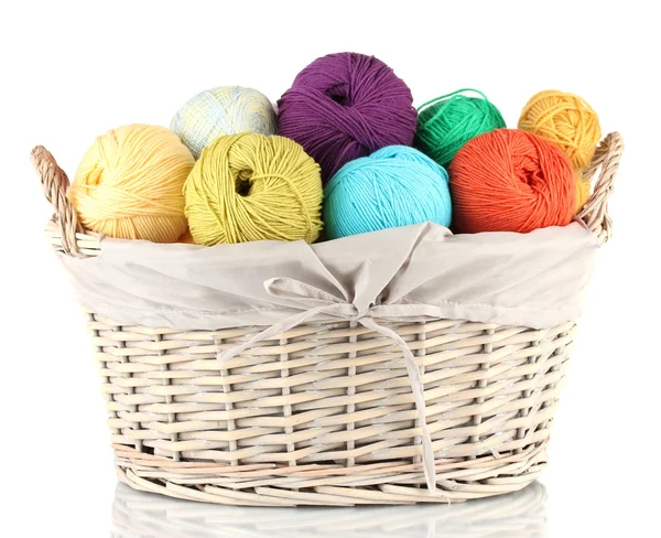 Colorful yarn balls in wicker basket isolated on white — Stock Photo, Image