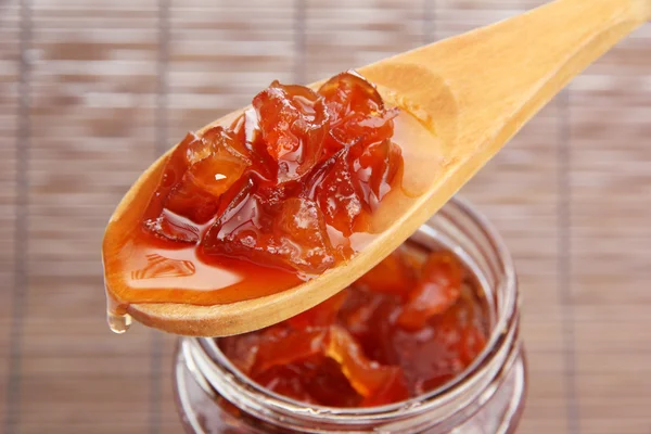 Tasty homemade jam, on bamboo mat — Stock Photo, Image