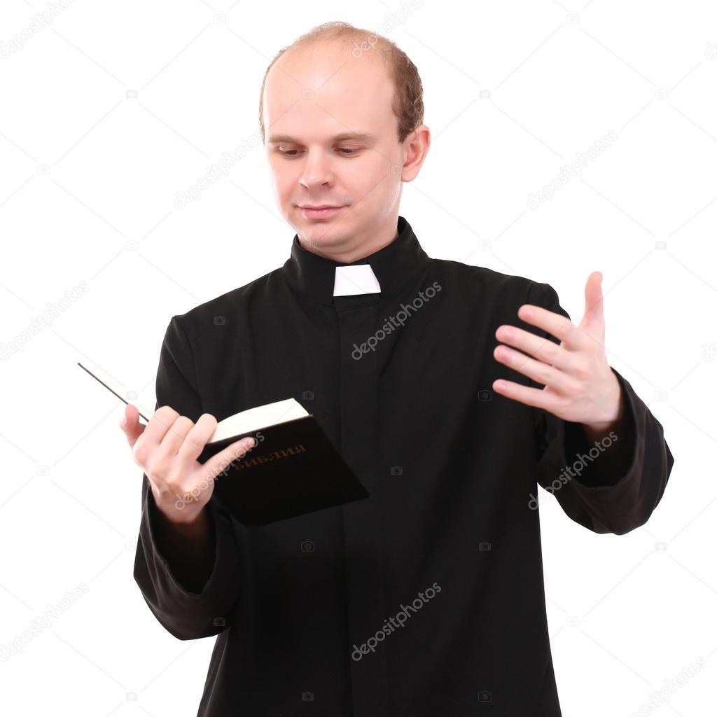 Young pastor with Bible, isolated on white