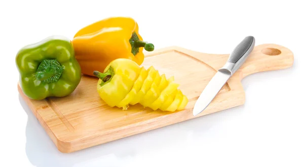 Paprika and knife on wooden cutting board isolated on white — Stock Photo, Image