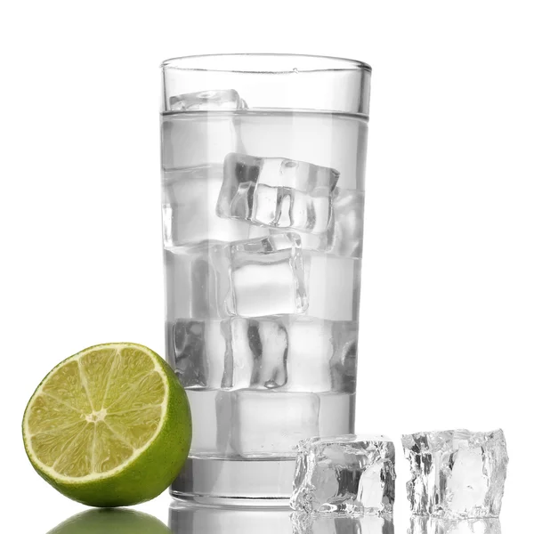 Ice cubes in glass with lime isolated on white — Stock Photo, Image