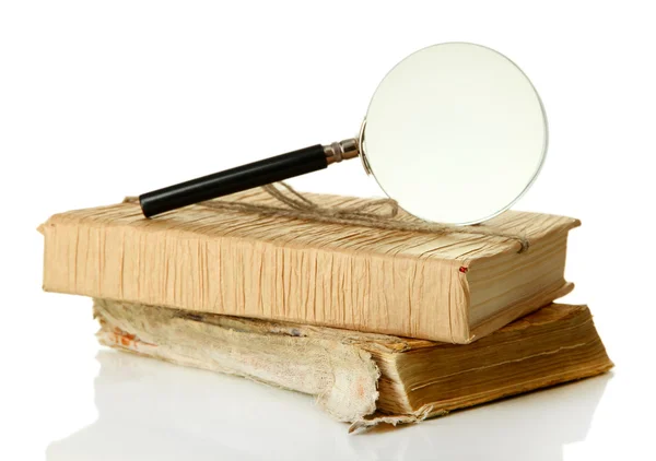 Lupe und Buch isoliert auf weiß — Stockfoto