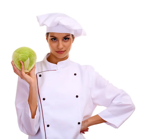 Retrato de mujer joven chef con verduras aisladas en blanco — Foto de Stock