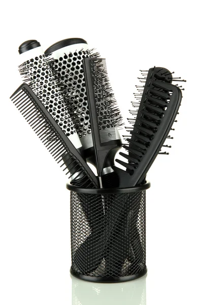 Iron basket with combs and round hair brushes, isolated on white — Stock Photo, Image
