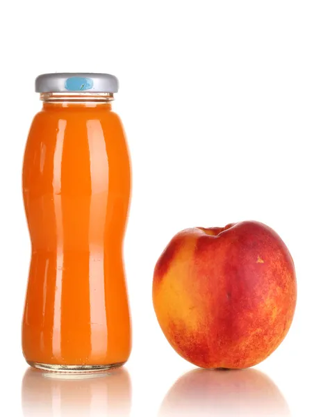 Delicious peach juice in glass bottle and peach next to it isolated on white — Stock Photo, Image