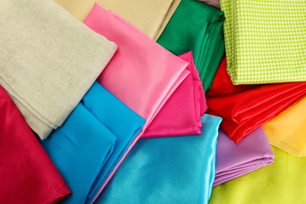 Heap of cloth fabrics, close up — Stock Photo, Image