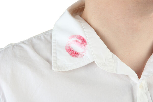 Lipstick kiss on shirt collar of man, isolated on white