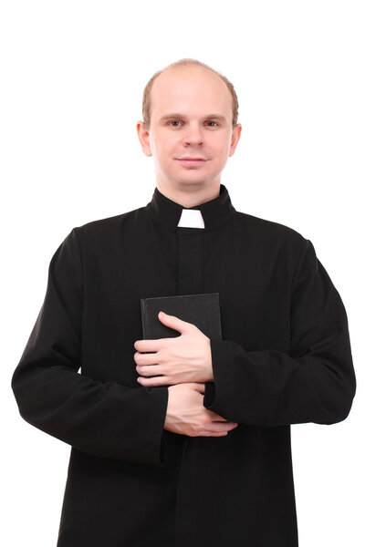 Young pastor with Bible, isolated on white