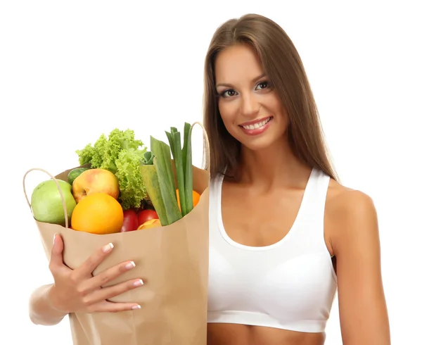 Hermosa mujer joven con verduras y frutas en bolsa de compras, aislado en blanco —  Fotos de Stock