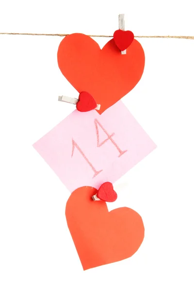 Paper hearts and card on rope, isolated on white — Stock Photo, Image