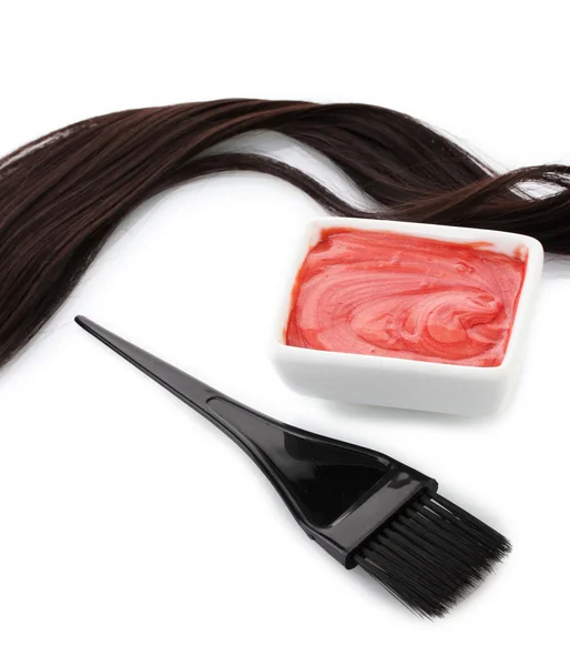 Bowl with hair dye and black brush on white background close-up Royalty Free Stock Photos