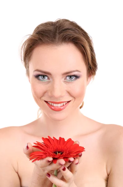 Beautiful young woman with bright make-up, holding flower, isolated on white Stock Picture