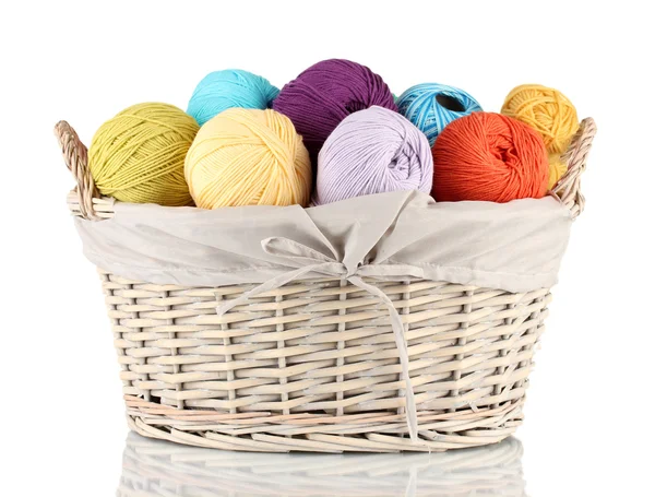 Colorful yarn balls in wicker basket isolated on white — Stock Photo, Image