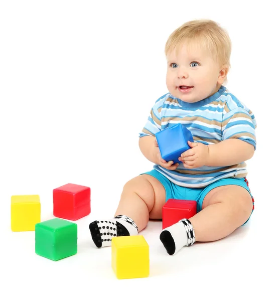 Little boy playing with multicolor blocks Stock Photo