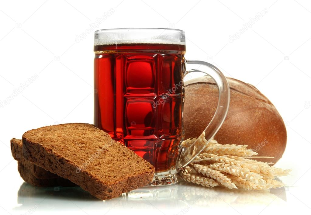 tankard of kvass and rye breads with ears, isolated on white