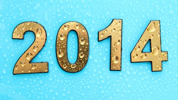 2014 in golden numbers, on blue background — Stock Photo, Image