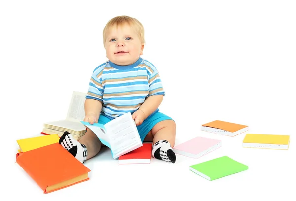 Kleiner Junge mit bunten Büchern, isoliert auf weiß — Stockfoto