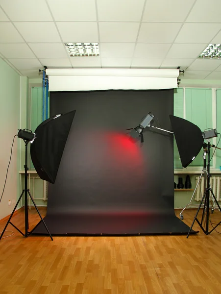 Empty photo studio with lighting equipment — Stock Photo, Image