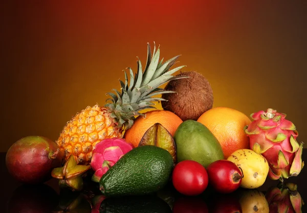 Composition of exotic fruits on colorful background — Stock Photo, Image