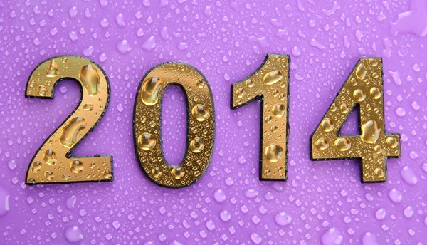 2014 in golden numbers, on purple background — Stock Photo, Image