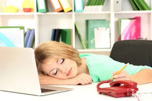 Tired business woman working in office — Stock Photo, Image