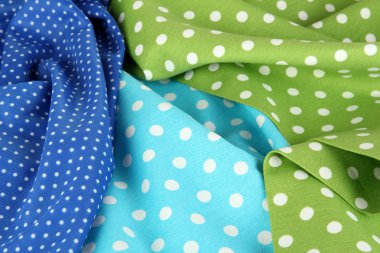 Benekli kumaşlar yakın çekim arka planını renklendirin