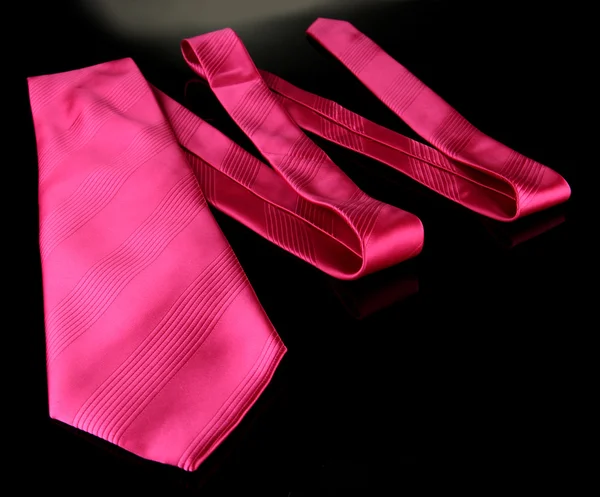 Pink tie on grey background — Stock Photo, Image