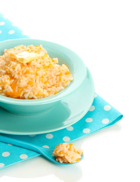 Pruebe la papilla de arroz con calabaza en un tazón azul, aislado en blanco —  Fotos de Stock