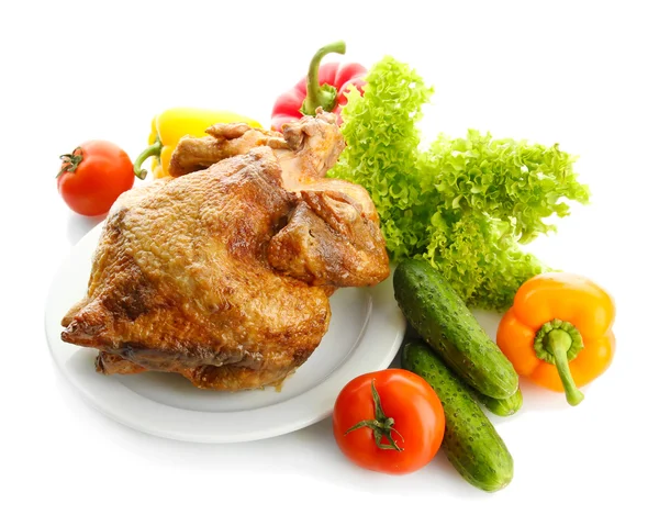 Tasty whole roasted chicken on plate with vegetables, isolated on white — Stock Photo, Image