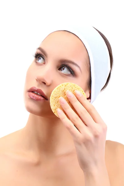 Young woman cleansing her face, isolated on white — Stock Photo, Image