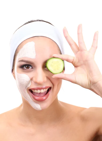 Young woman with clay facial mask, isolated on white — Stock Photo, Image