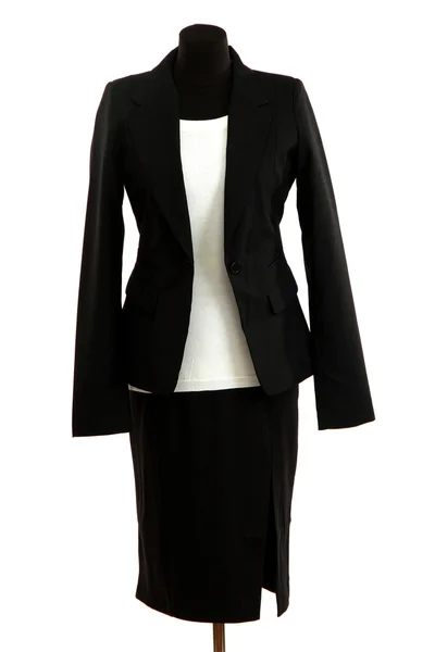 Blusa blanca y falda negra con abrigo sobre maniquí aislado sobre blanco —  Fotos de Stock