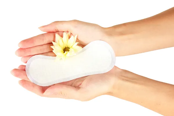 Woman's hands holding a daily sanitary pad on white background close-up — Stock Photo, Image